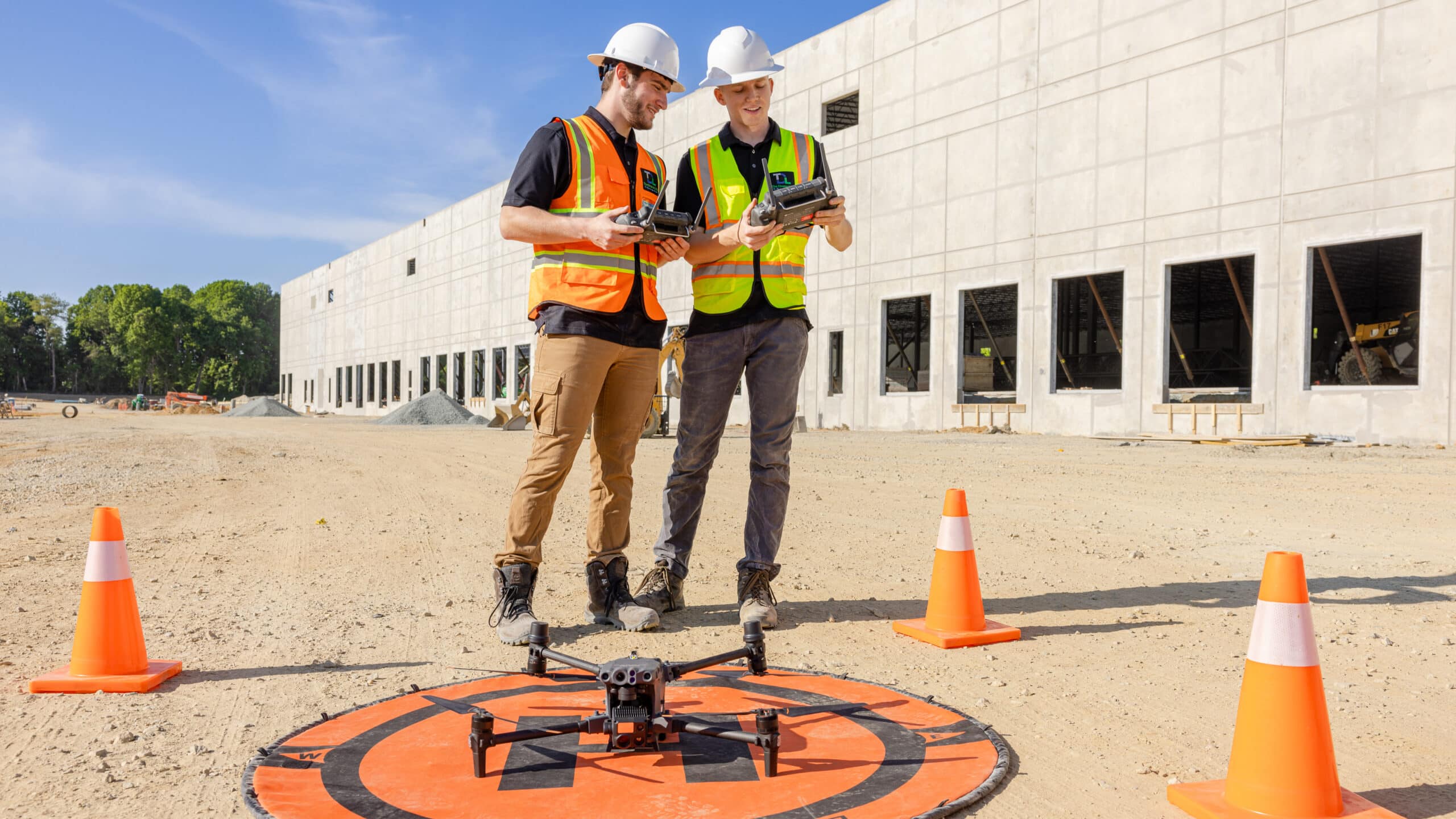 The Drone Life Pilots Preparing for an Inspection at a Construction Site